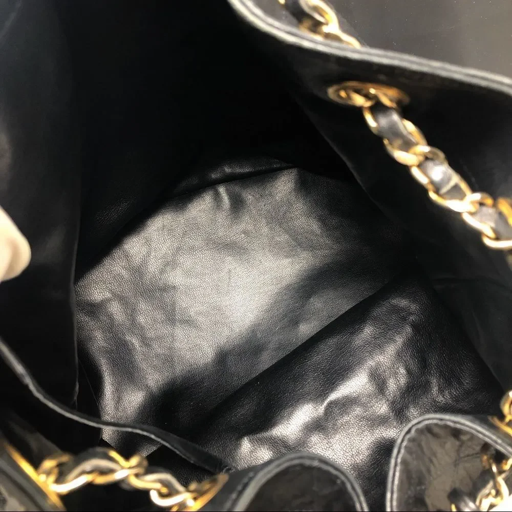 Vintage Chanel Black Lambskin Quilted CC Drawstring Bucket Bag Leather Backpack